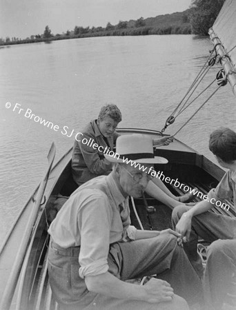 ON THE RIVER WAVENER BOBBIE THROCKMORTON STEERING WITH CHARLES & MICHAEL HASTINGS IN YACHT